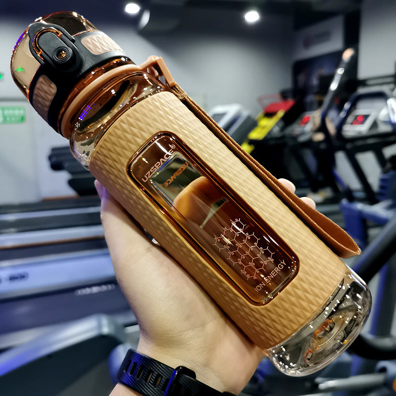 Brown portable sport water bottle with ion energy design