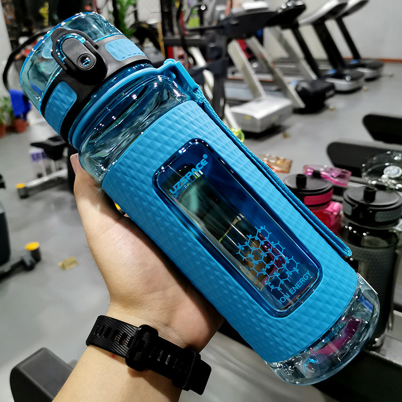 Light blue portable sport water bottle with honeycomb design
